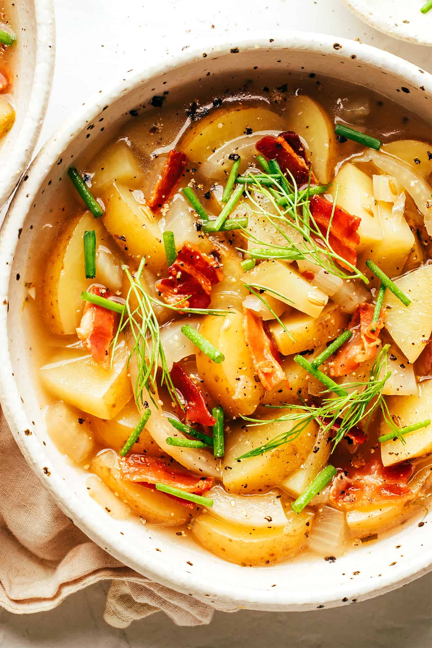 Sopa de batata com bacon e erva-doce